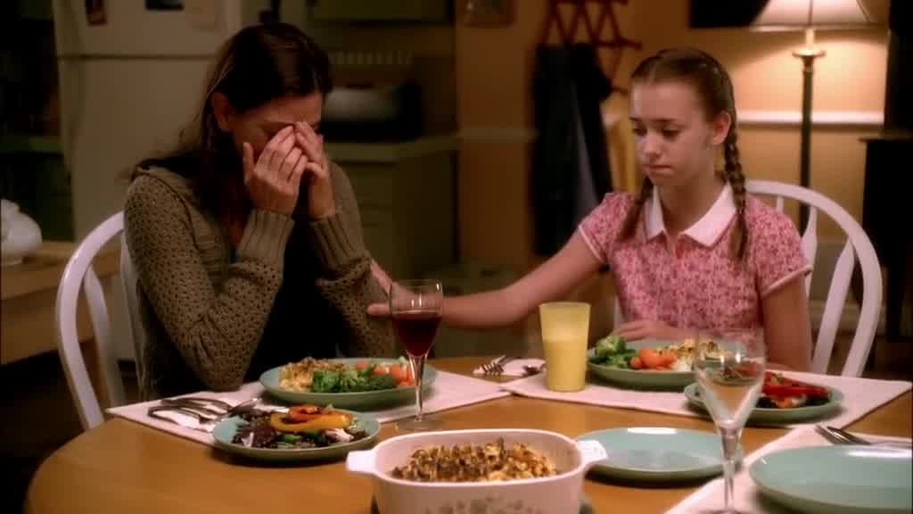 SUSAN starts crying, as JULIE rubs her arm.jpg