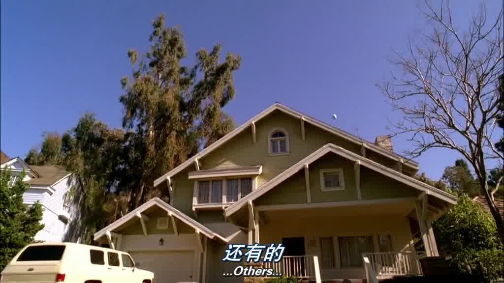 A soccer ball is kicked high in the air towards a house.jpg