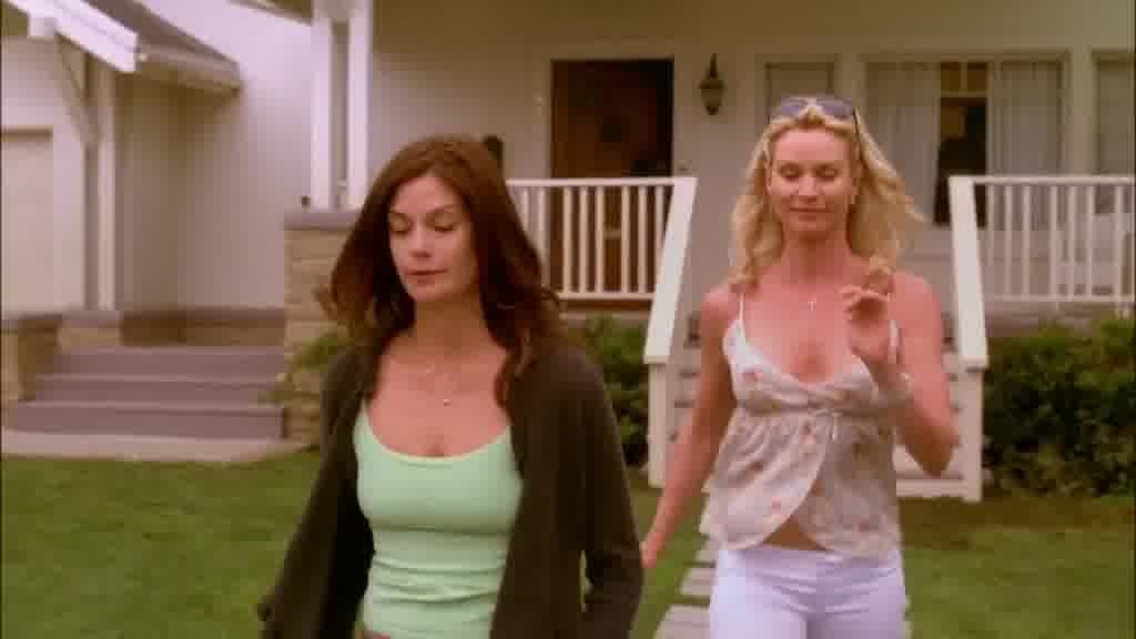 EDIE smiles, following SUSAN down the path.jpg