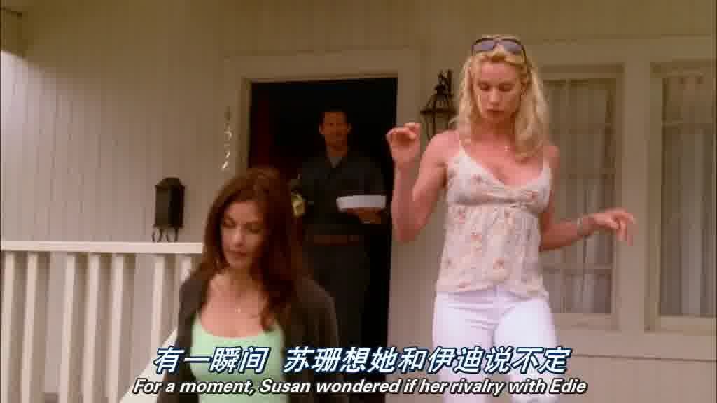 SUSAN and EDIE walk down the steps of the porch, and down the walkway.jpg