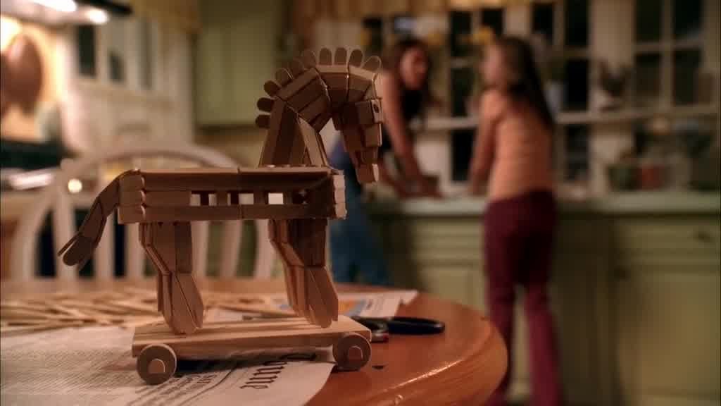 Trails off as she and JULIE turn to notice JULIE's miniature Trojan horse s.jpg