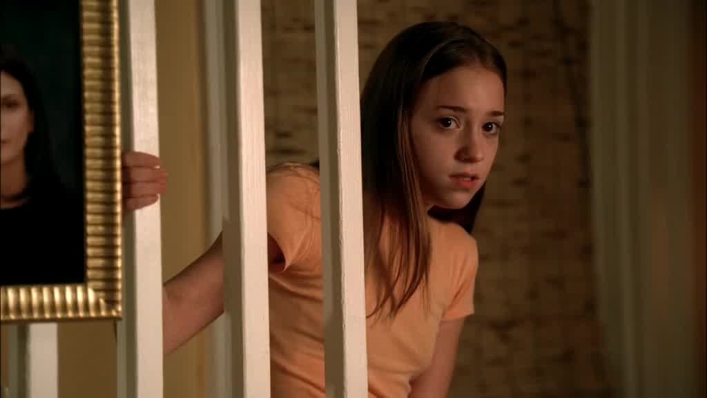 JULIE creeps down the stairs to peer out at them.jpg