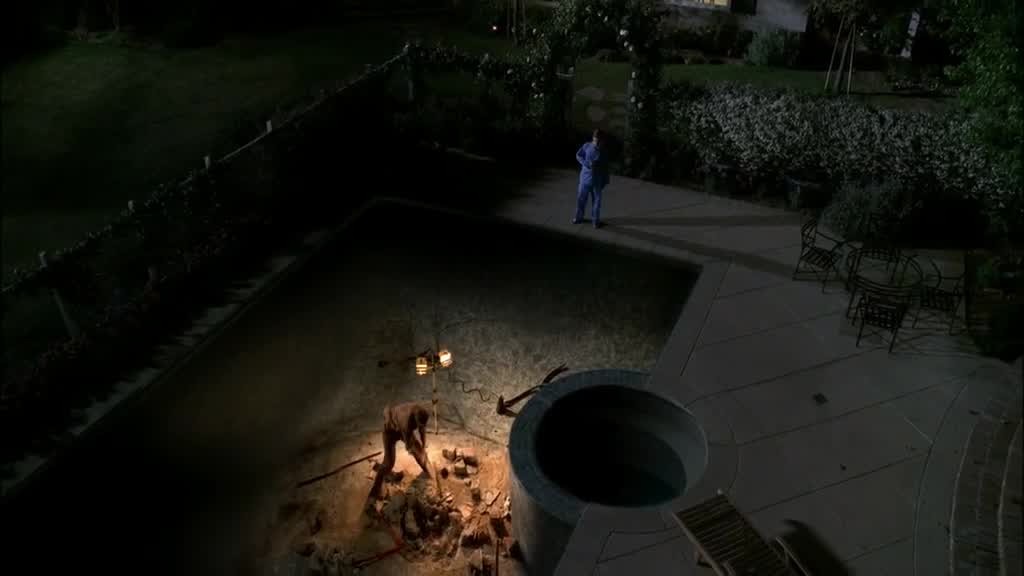 ZACH just stands at the side of the pool, watching, as we hear the sounds of PAU.jpg