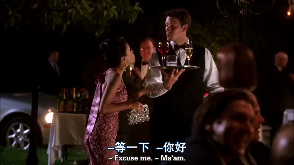 GABRIELLE looks around, and stops a WAITER passing by.jpg