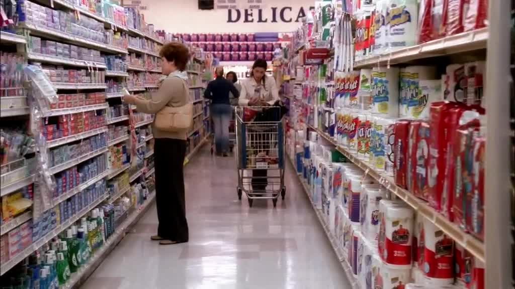 SUSAN pushes her cart along the aisle.jpg