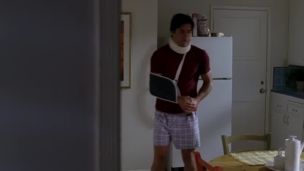 We see the cable guy, with his arm in a sling and his neck in a brace.jpg
