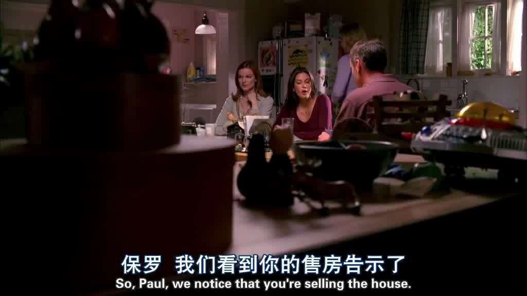 They're all sitting around the kitchen table.jpg