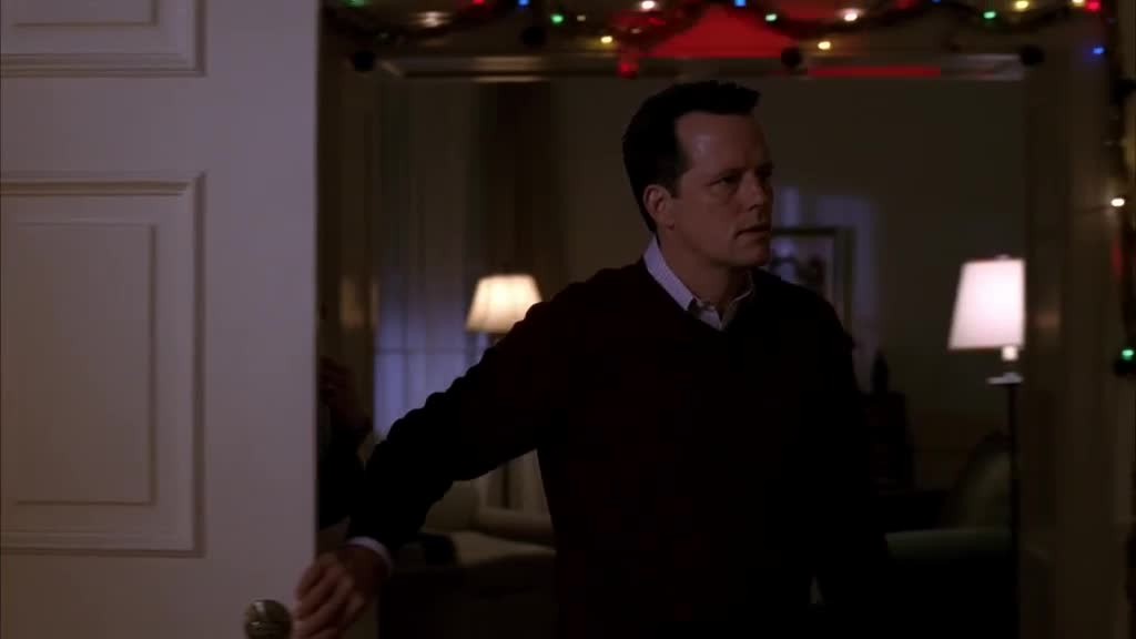 He opens the front door and leads them inside.jpg