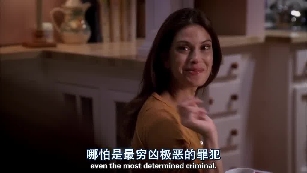 She looks over her shoulder and smiles and waves at Mike.jpg
