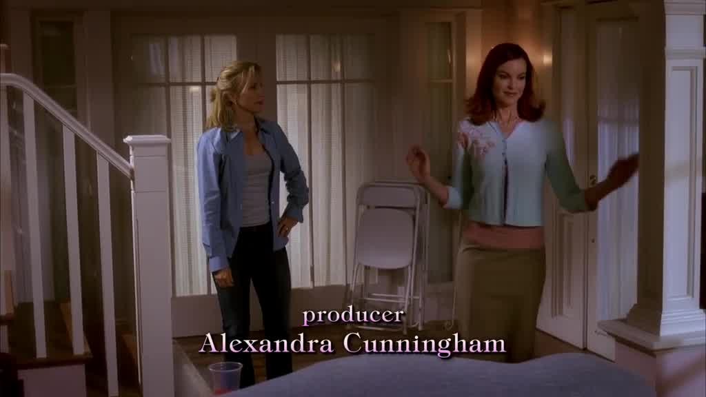 she puts her hands up as if she's not going to say anything.jpg