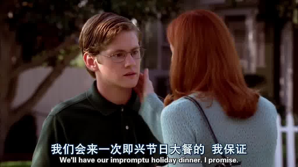 She reaches out to touch his face.jpg