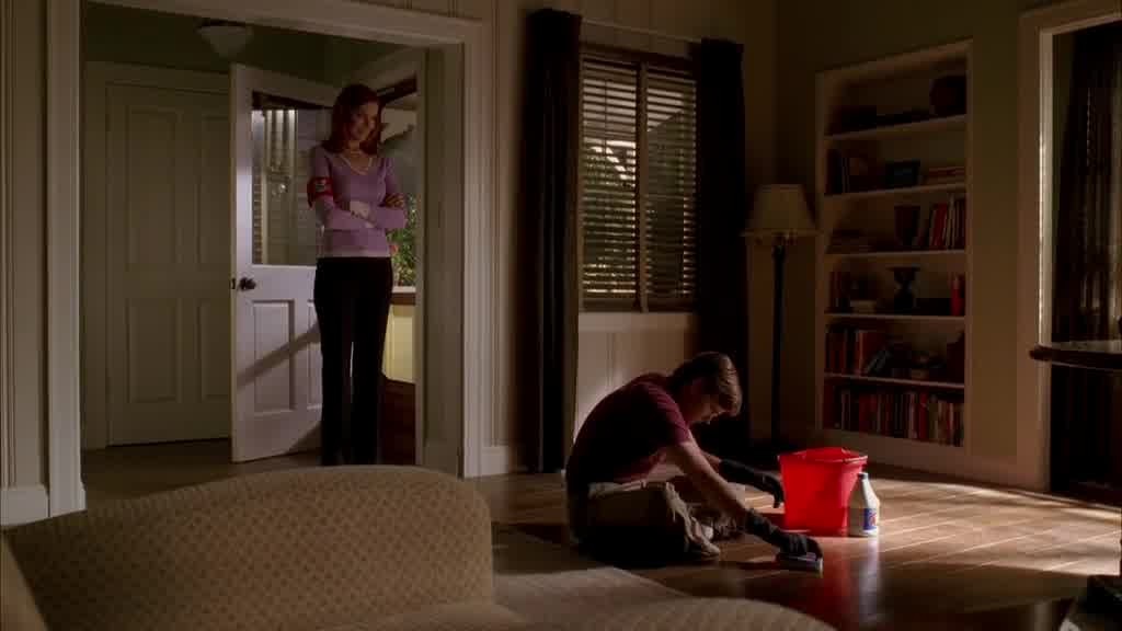She stops and looks around the room.jpg