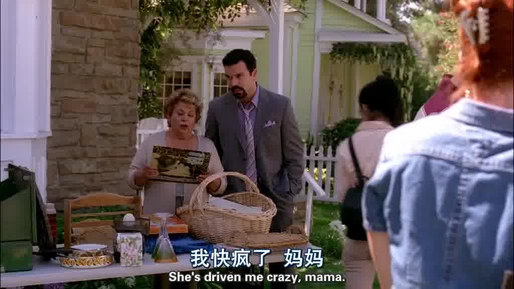 Carlos and Mama Solis stand off in a corner.jpg