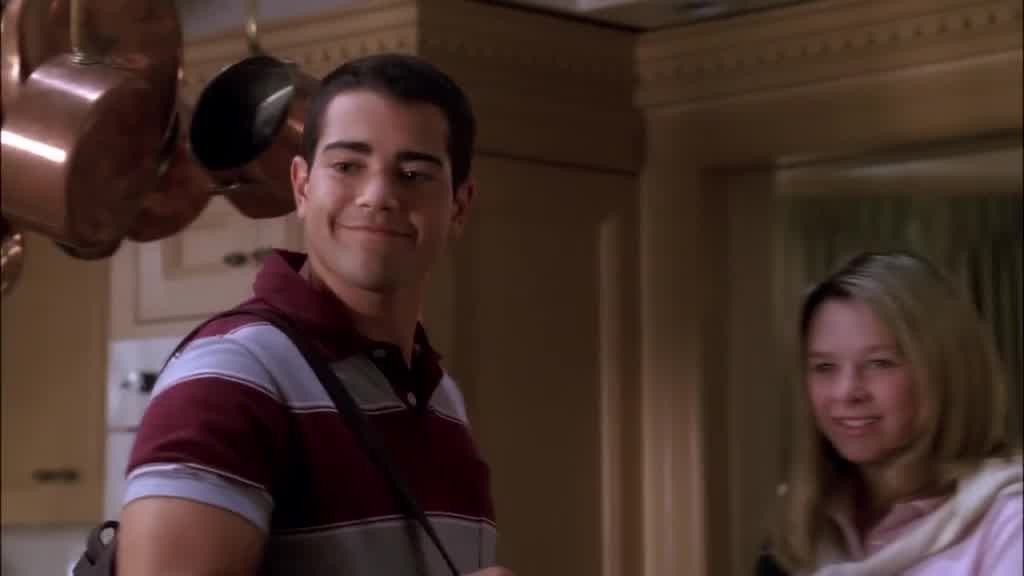 Danielle walks into the house with John.jpg