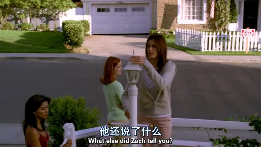 Susan is changing a light bulb in her lamp.jpg
