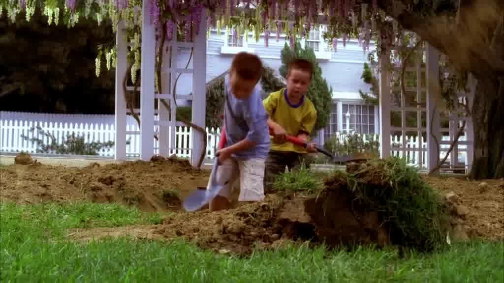 There are multiple shots, each with the boys a little further into the hole.jpg
