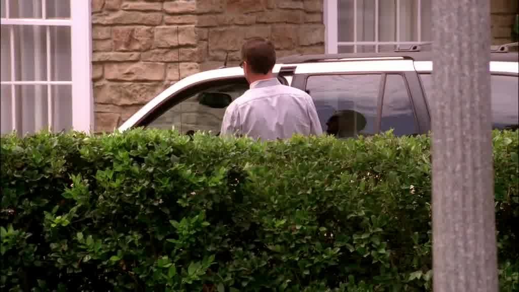He pulls into a parking lot and gets out.jpg