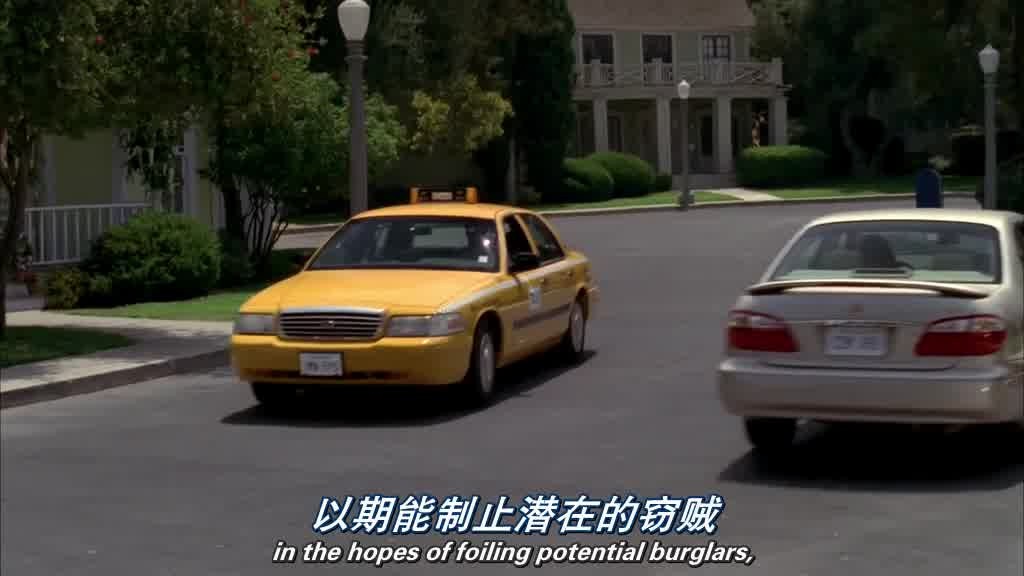 we see a taxi driving down WisteriaLane.jpg