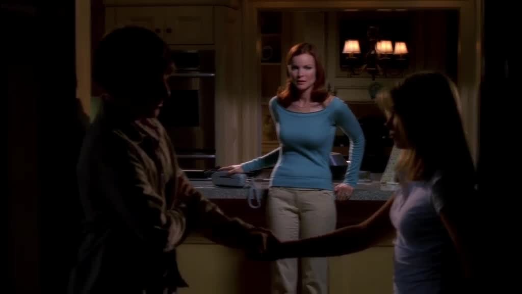 Danielle and Andrew hold each other's hands.jpg
