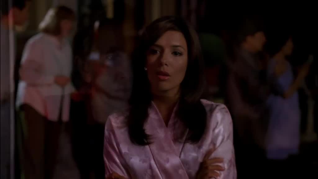 Gabrielle watches Mama Solis taken away on a stretcher.jpg