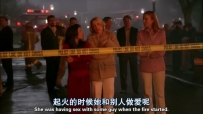 S01E01 SUSAN walks up to where LYNETTE, BREE and GABRIELLE are standing together behind the police tape, facing the burning house