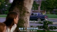 S01E04 We see Susan and Julie hiding behind a tree in their garden