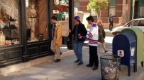 S01E04 He kicks it to Ross, but Ross is staring into a shop window.