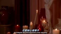 S01E01 SUSAN throws EDIE's bra behind her, where it catches the flame of the candles