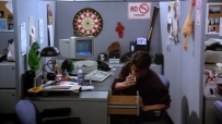 S01E03 Chandler'soffice,Chandler looks around,opens his desk drawer,takes a puff of a cigarette
