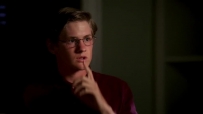 S01E03 ZACH puts a finger to his lips, mouthing as he goes to the door