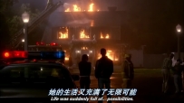 S01E01 SUSAN smiles, looking back at the burning house