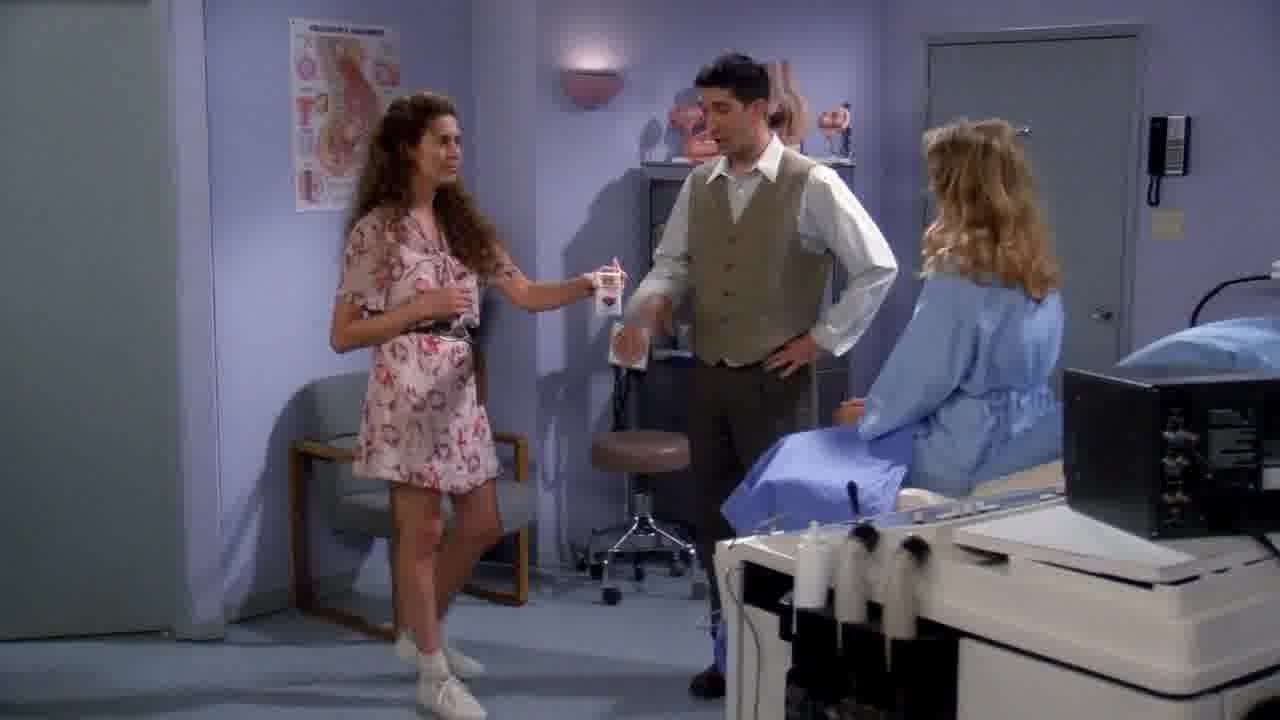 Susan gives her drink to Carol.jpg